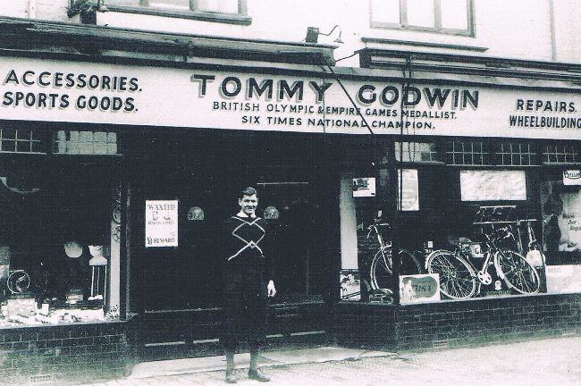 Tommy outside his shop